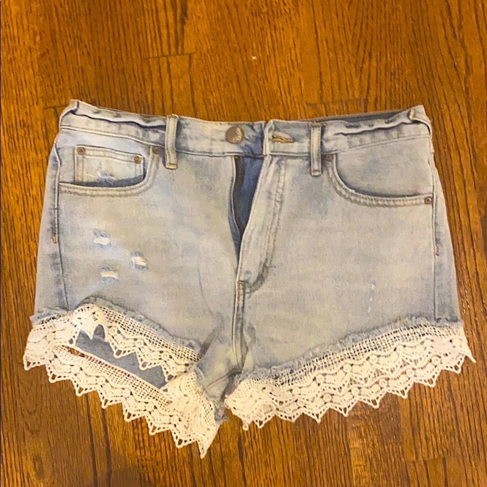 Free People denim shorts with lace